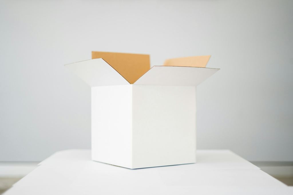 Commercial packaging on a desk, representing a trade enquiry in progress
