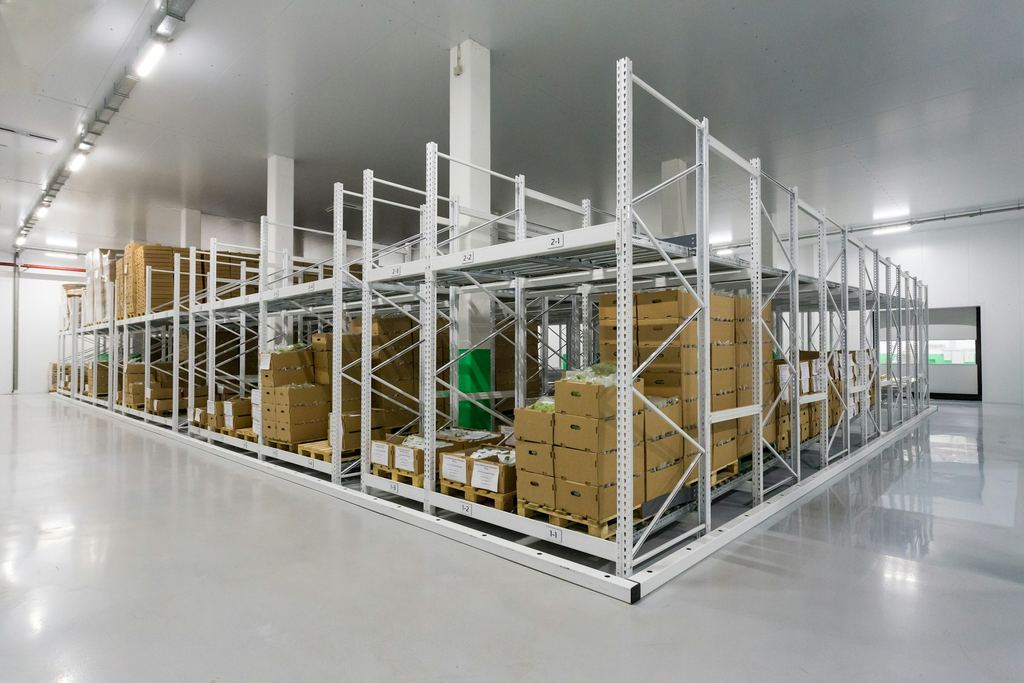 Clean pallet racking used to represent general trade goods categories rather than live inventory