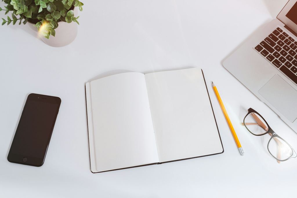 Everyday workplace desk items, representing general business supply categories